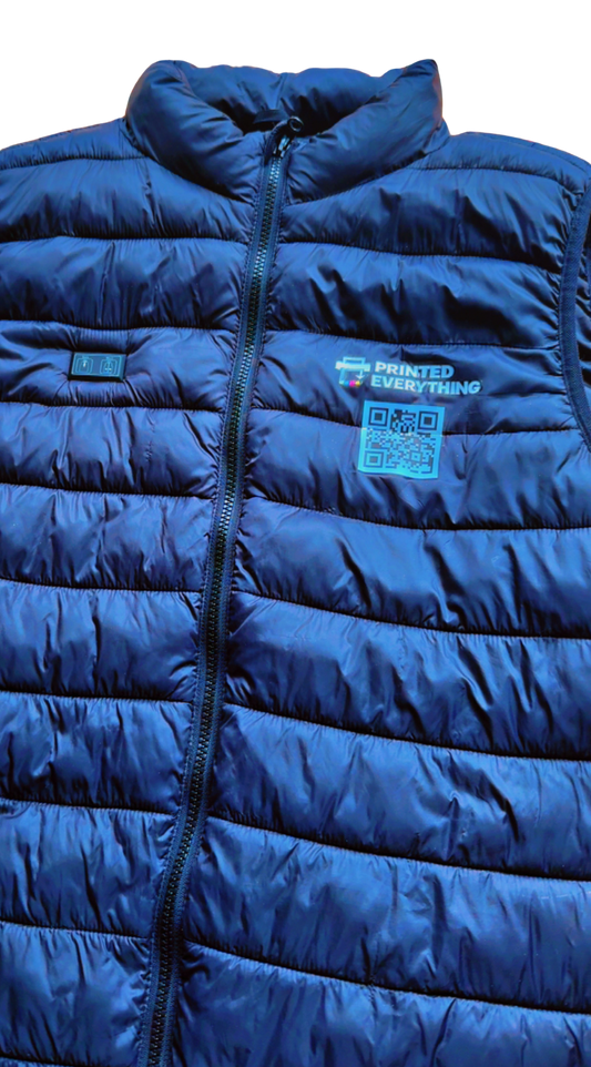 Custom USB heated vest by Printed Everything DTF Studio featuring logo print, with visible heating panels and fabric details.