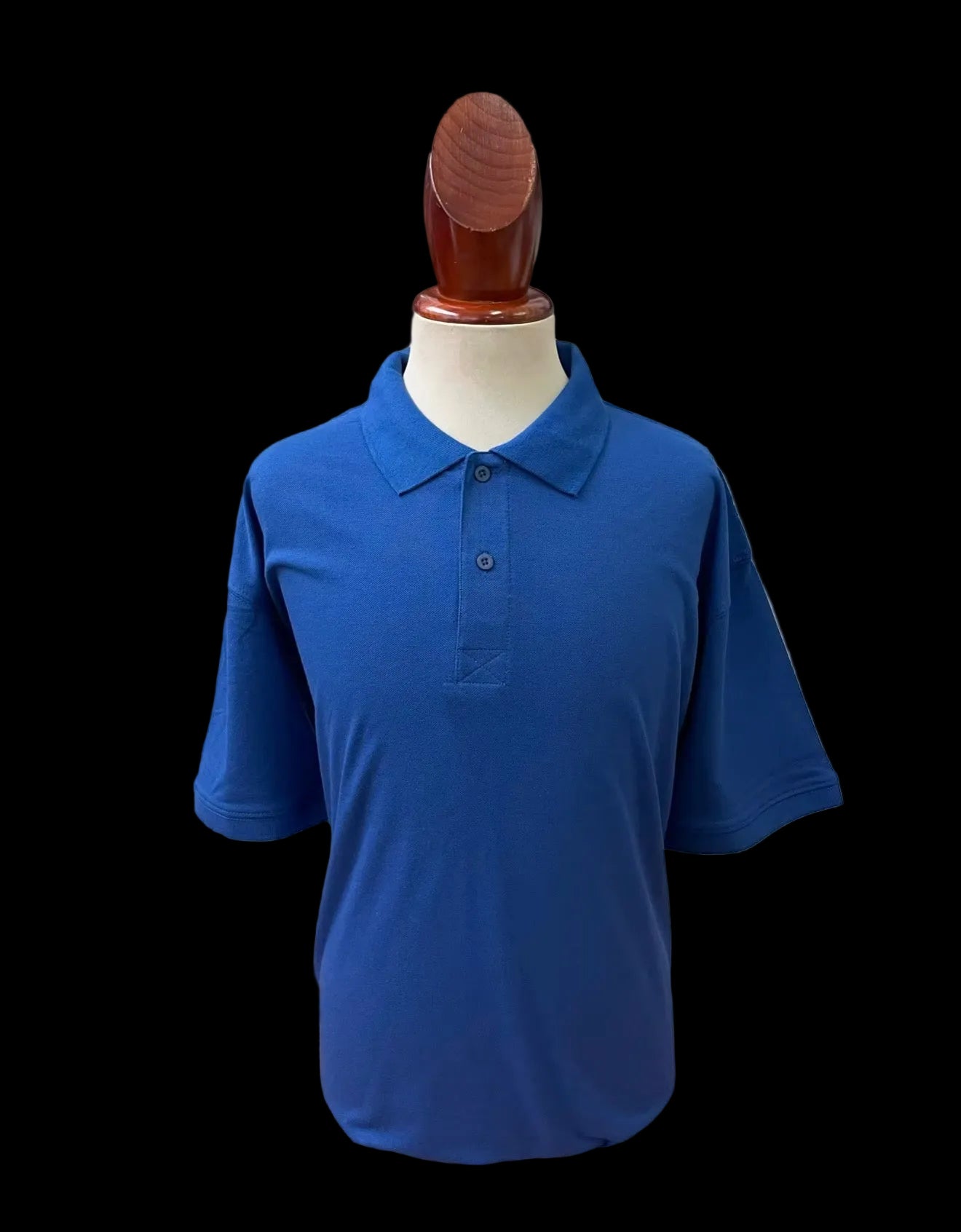 Royal Blue polo shirt on a mannequin against a white background
