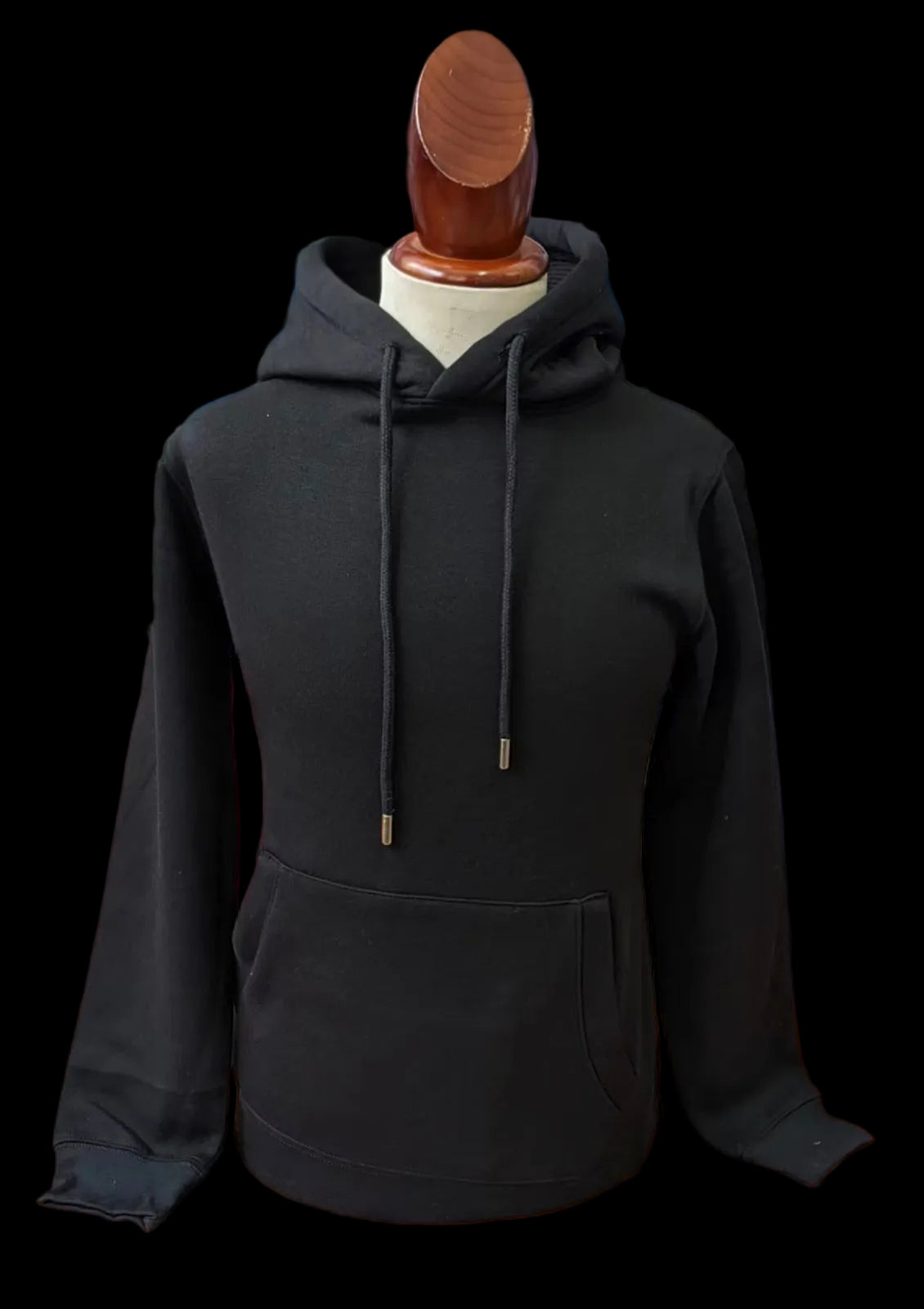 Black hoodie on a mannequin in a store setting