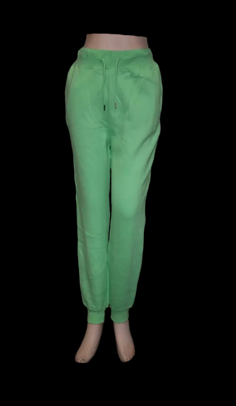 Green sweatpants on a white background