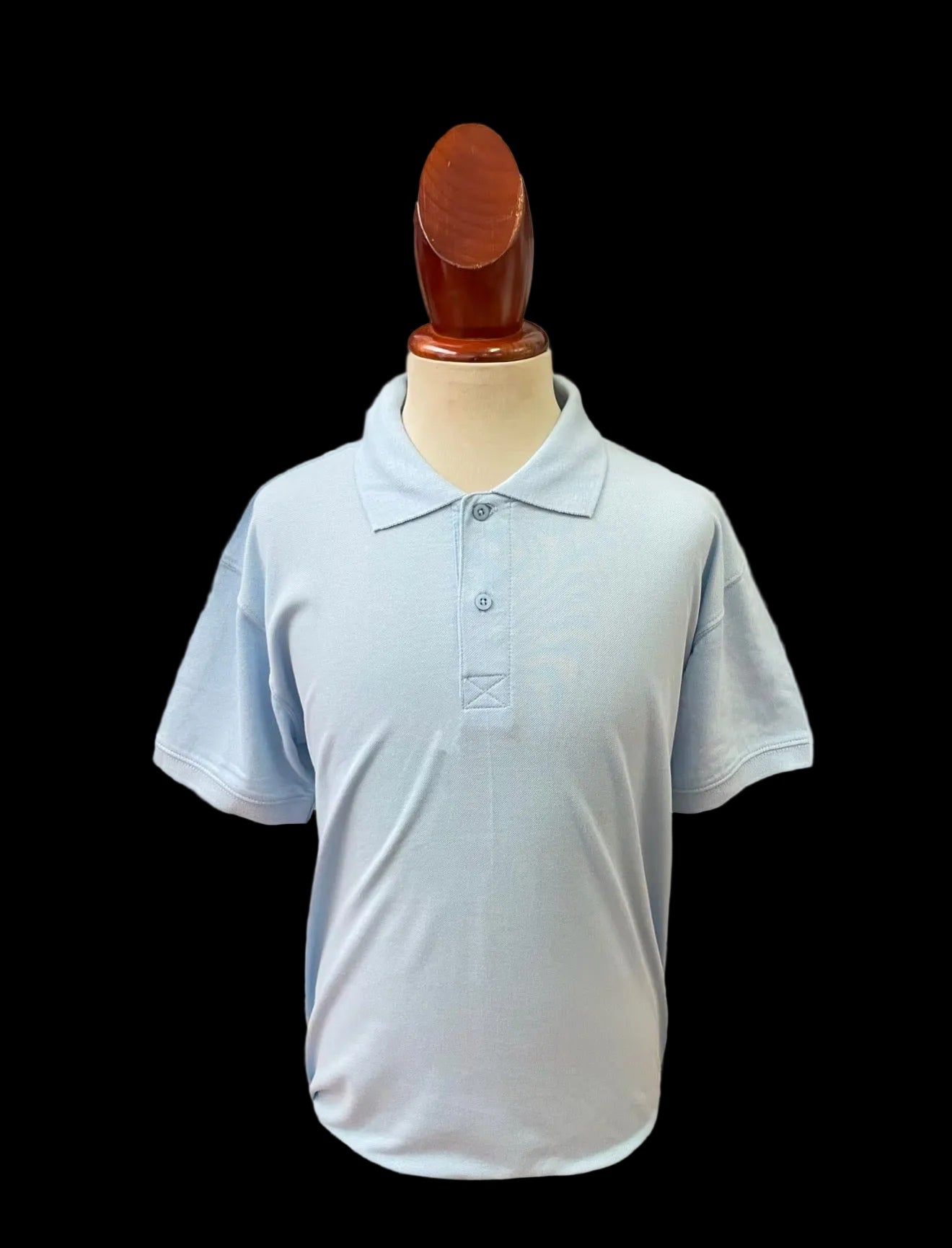 Sky blue polo blank shirt on a mannequin against a plain background